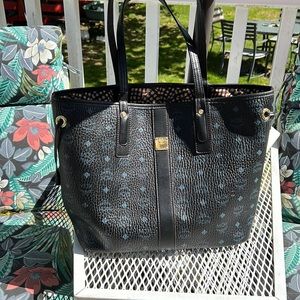 Large Black with blue lettering MCM tote bag with pouch